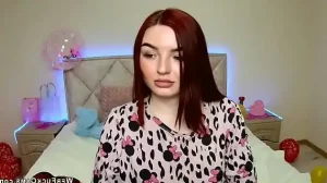 Redhead webcam girl performing solo for fans